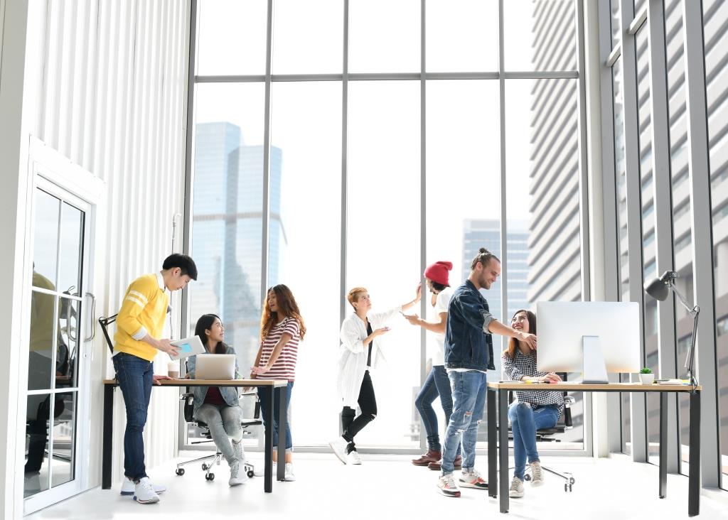 Group of businesspersons discussing  work at the office